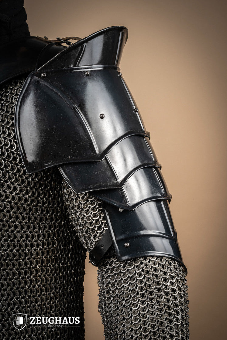 Pauldrons with Bladebreakers Champion Burnished showcasing flexible design, leather straps, and clean craftsmanship.