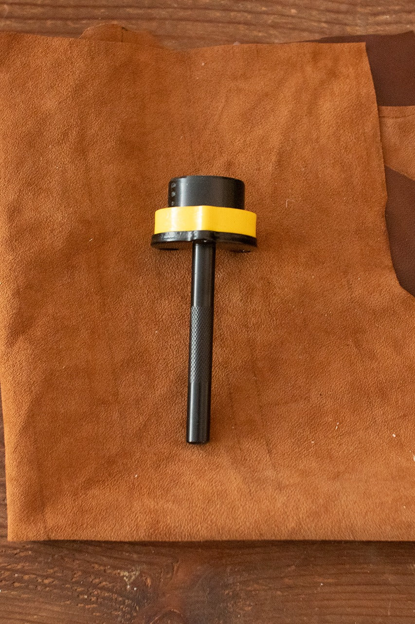 Point End Punches with a cone shape, measuring 15mm x 32mm, featuring a durable iron handle for precise leather crafting.