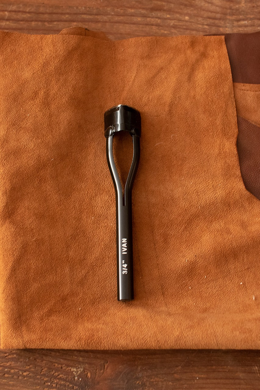 A set of 20 mm Point End Punches with tapered design and iron handles, ideal for finishing belts.