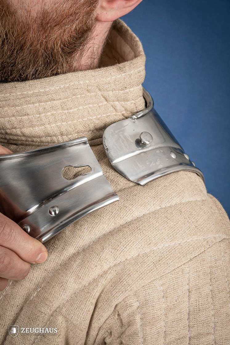 Pointed Gorget 1.6mm Polished made from mild steel, featuring angular front, squared-off back, and studded rim for added elegance.