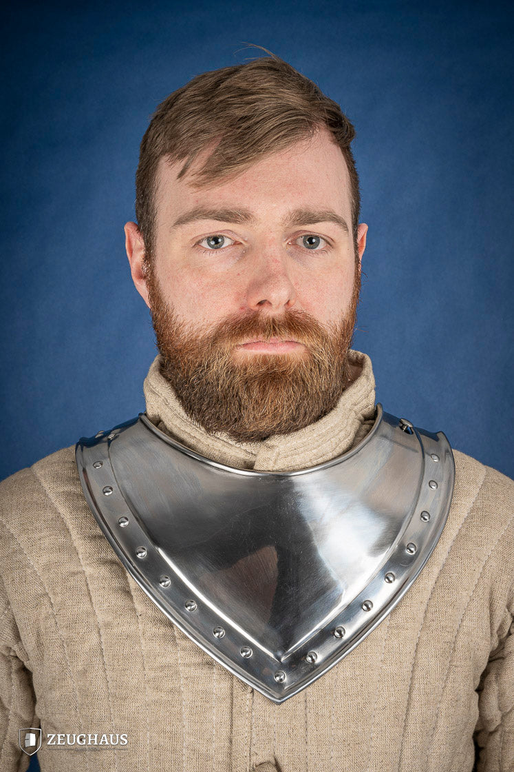 Pointed Gorget 1.6mm Polished made from mild steel, featuring angular front, squared-off back, and studded rim for added elegance.