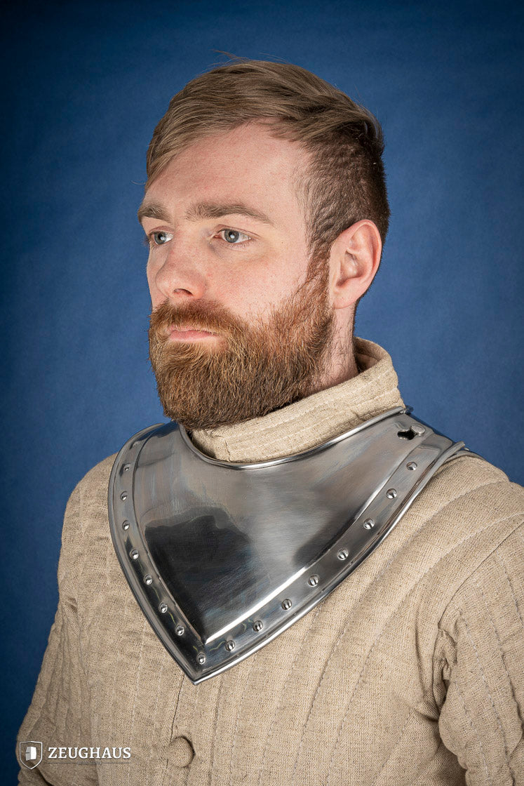 Pointed Gorget 1.6mm Polished made from mild steel, featuring angular front, squared-off back, and studded rim for added elegance.