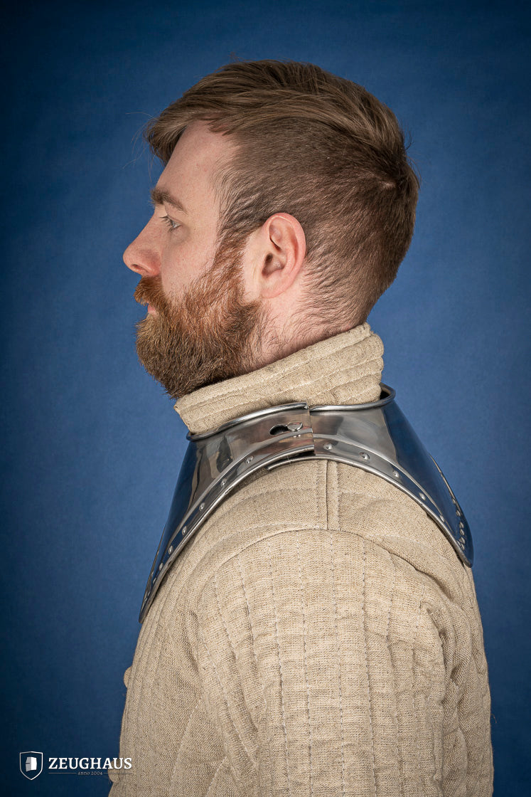 Pointed Gorget 1.6mm Polished made from mild steel, featuring angular front, squared-off back, and studded rim for added elegance.