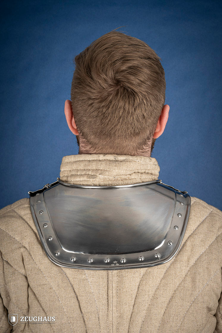 Pointed Gorget 1.6mm Polished made from mild steel, featuring angular front, squared-off back, and studded rim for added elegance.