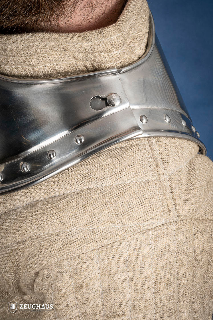 Pointed Gorget 1.6mm Polished made from mild steel, featuring angular front, squared-off back, and studded rim for added elegance.