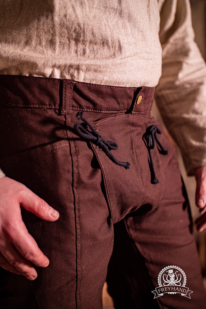 Pyrus Pants in Brown, showcasing a stylish design and comfortable fit, perfect for various occasions.