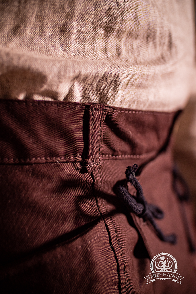 Pyrus Pants in Brown, showcasing a stylish design and comfortable fit, perfect for various occasions.