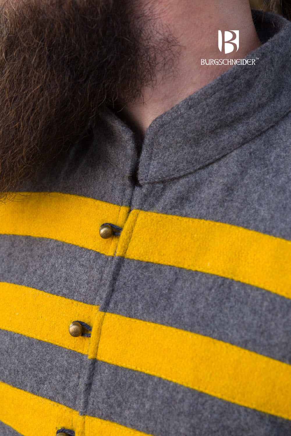 Bartosz Rus Coat in dark grey with vibrant yellow accents, featuring a standing collar and stylish buttons.