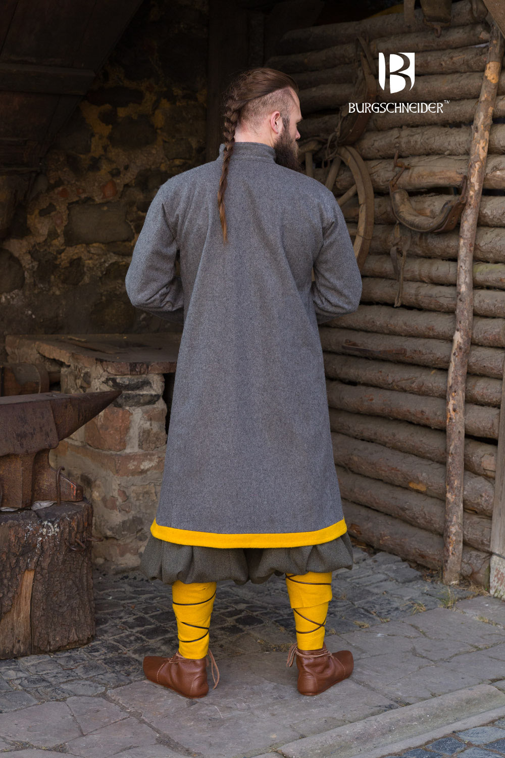 Bartosz Rus Coat in dark grey with vibrant yellow accents, featuring a standing collar and stylish buttons.