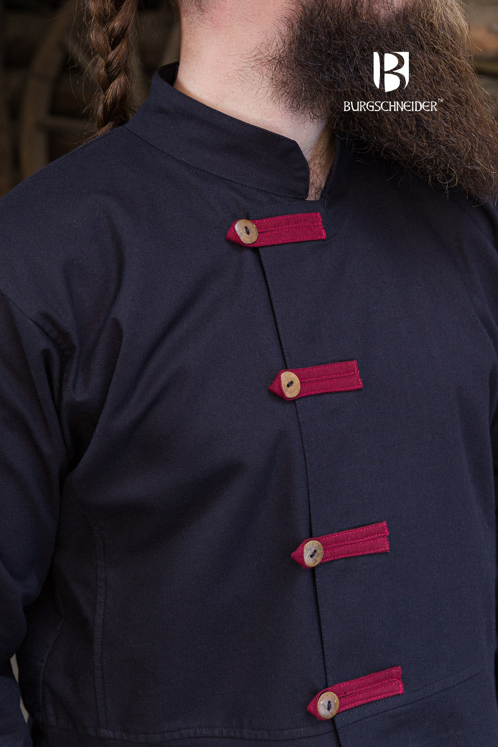 Jakub Rus Coat in Black with Bordeaux accents, featuring a lined standing collar and buttoned chest stripes.