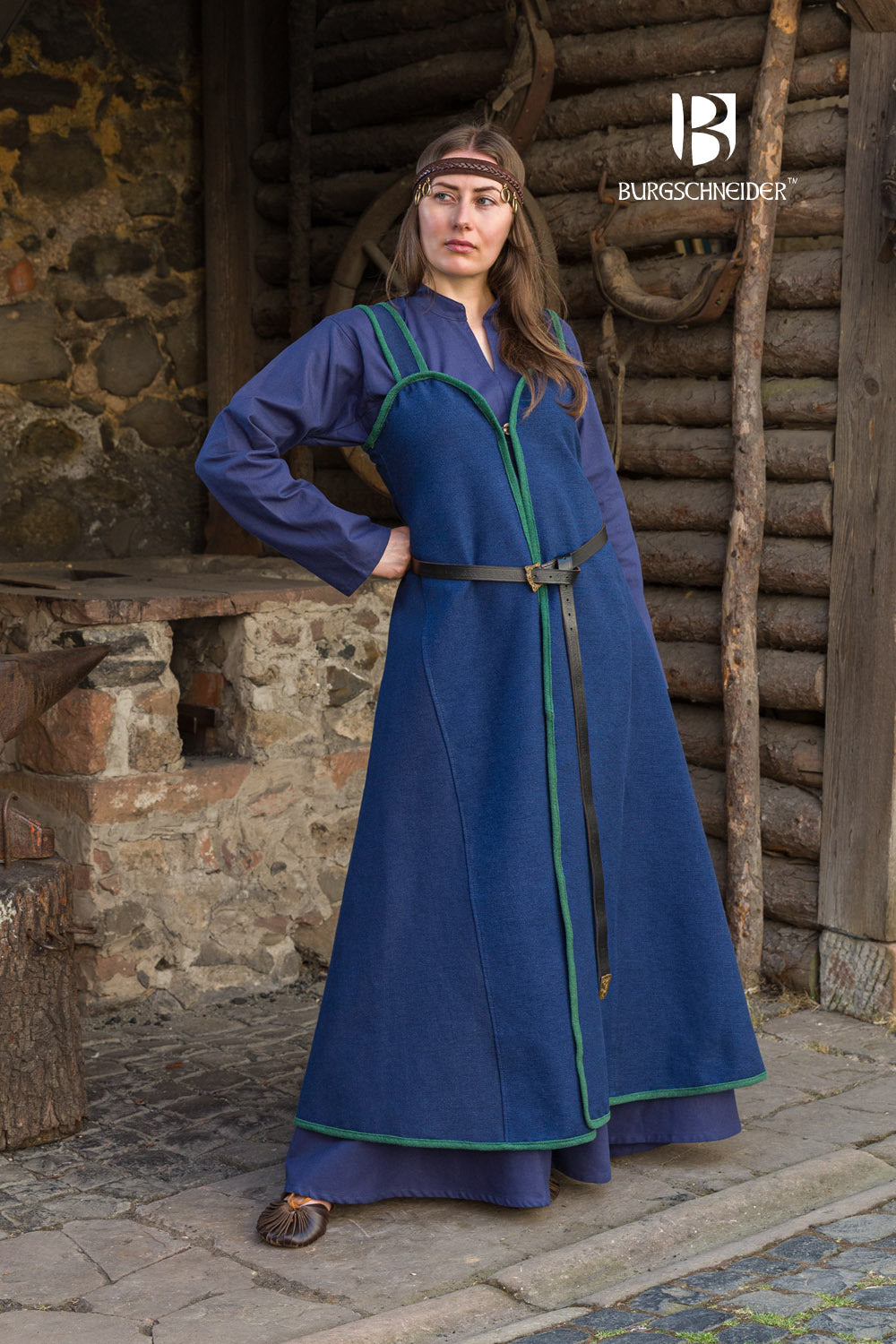 Katarzyna Rus Dress in blue with green edge binding, featuring over-the-shoulder straps and a button detail at the neckline.