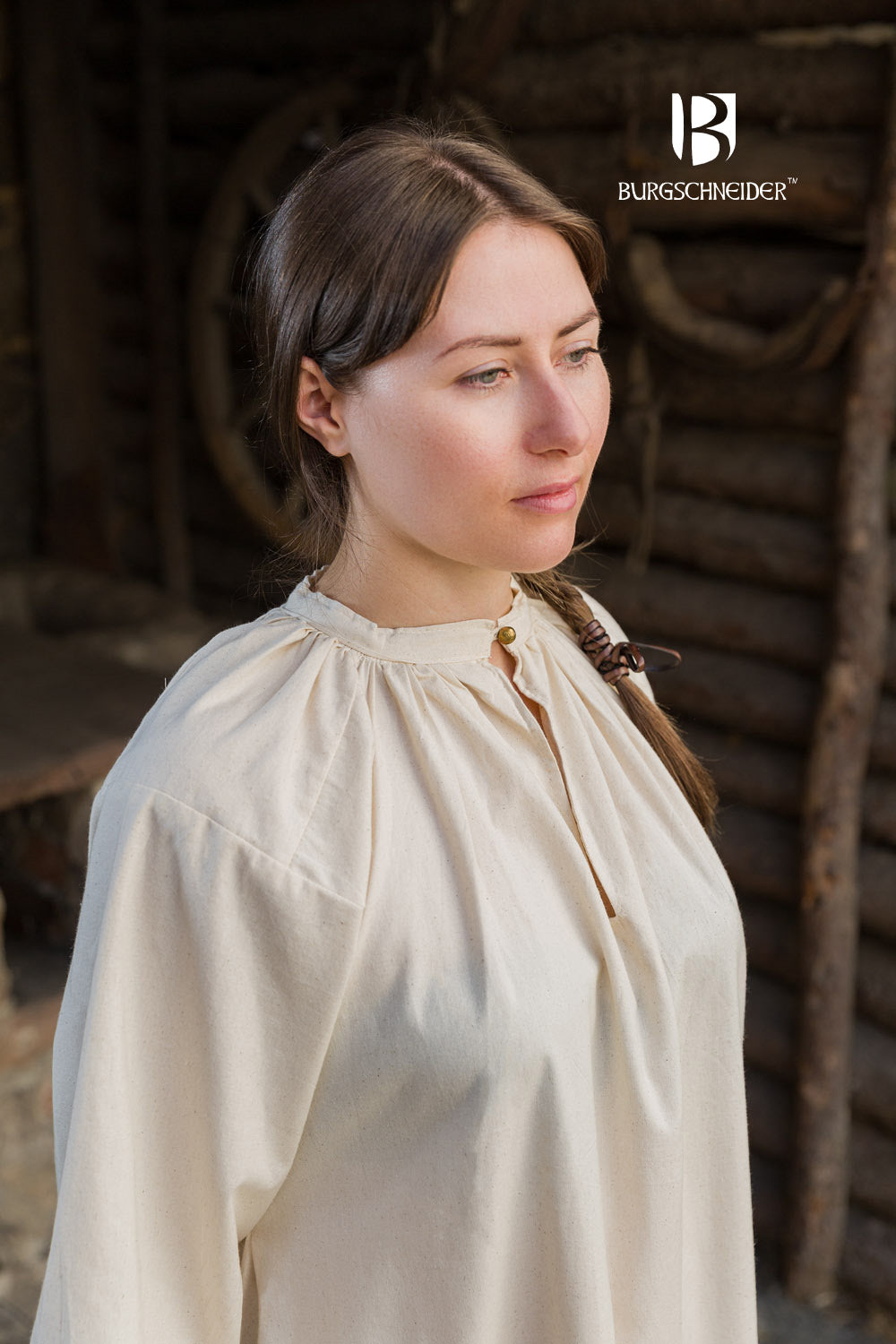 Lilia Rus Underdress in Natural color featuring brass buttons and gathered neckline, showcasing timeless elegance and comfort.