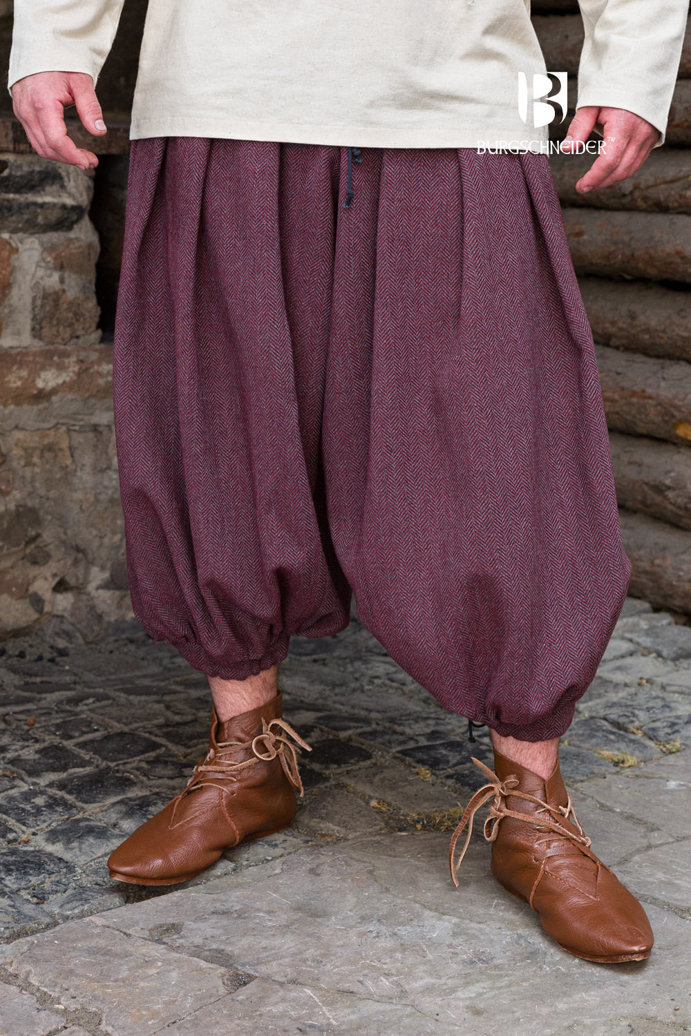 Rus Herringbone Pants in Burgundy and Grey with adjustable drawstrings and herringbone pattern, showcasing historical design.