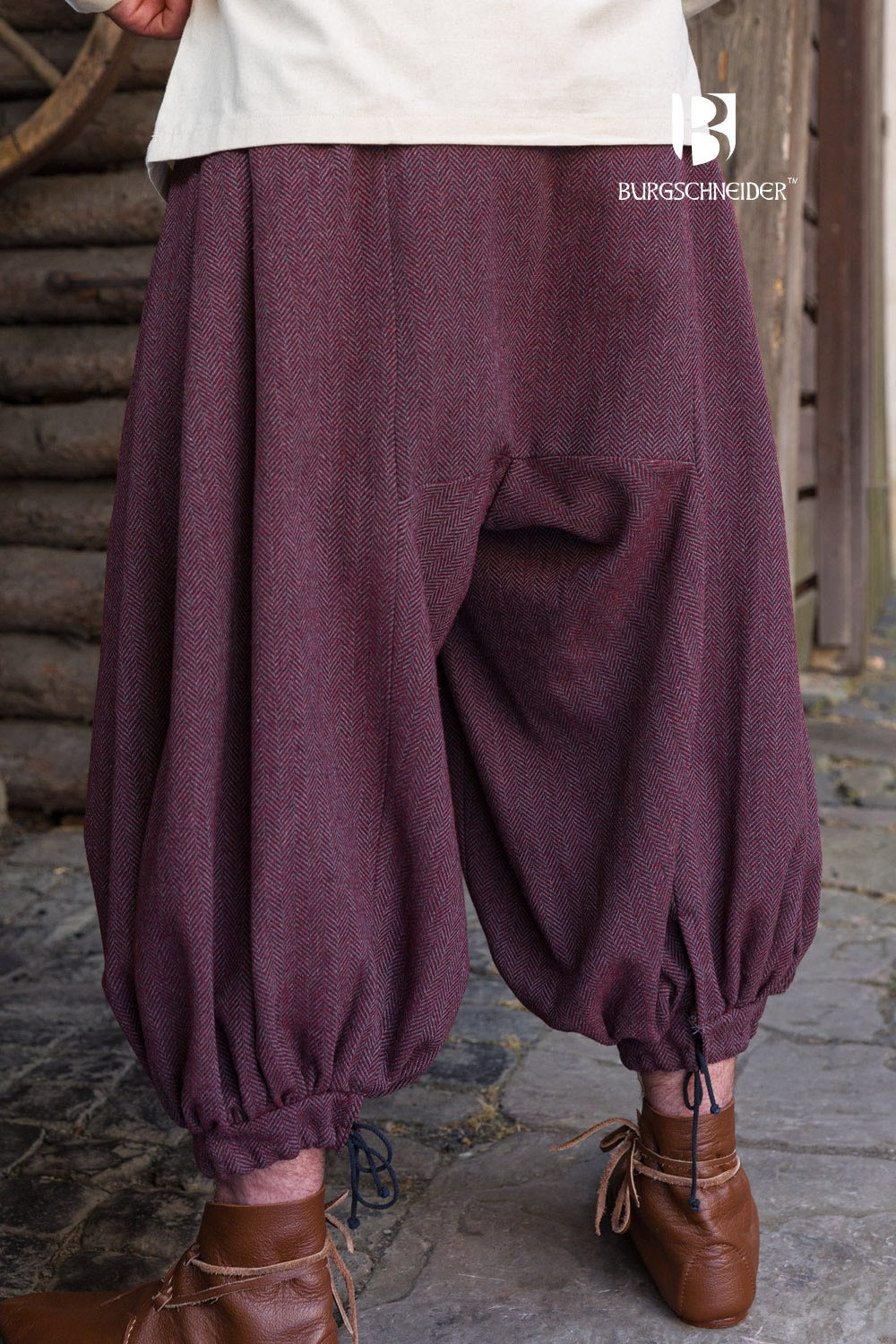 Rus Herringbone Pants in Burgundy and Grey with adjustable drawstrings and herringbone pattern, showcasing historical design.