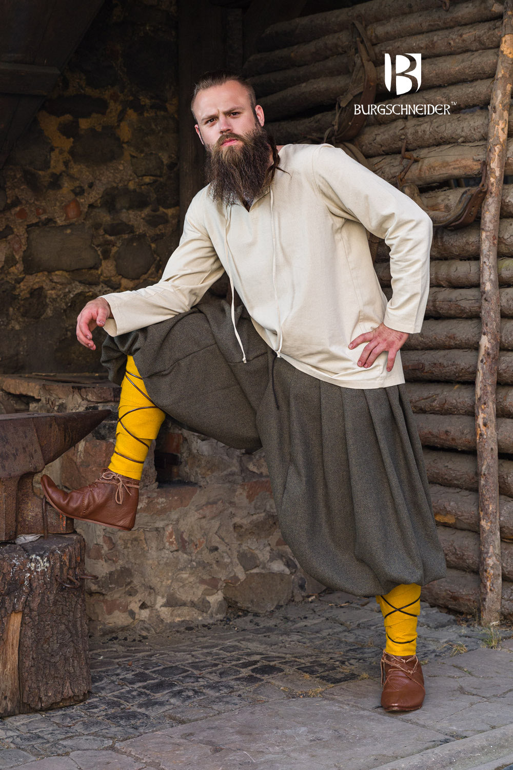 Rus Herringbone Pants in Olive/Grey featuring adjustable drawstrings and a unique herringbone pattern.