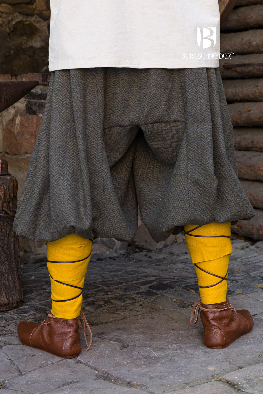 Rus Herringbone Pants in Olive/Grey featuring adjustable drawstrings and a unique herringbone pattern.