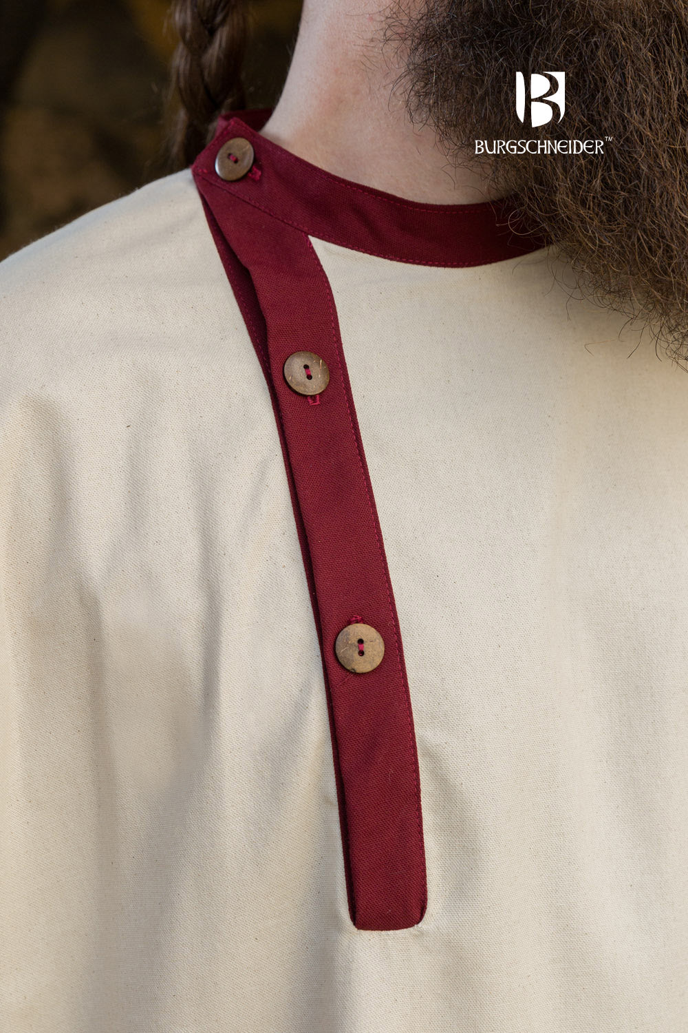 Tobiasz Rus Tunic in Natural color with Bordeaux accents on hem and collar, featuring side slits for mobility.