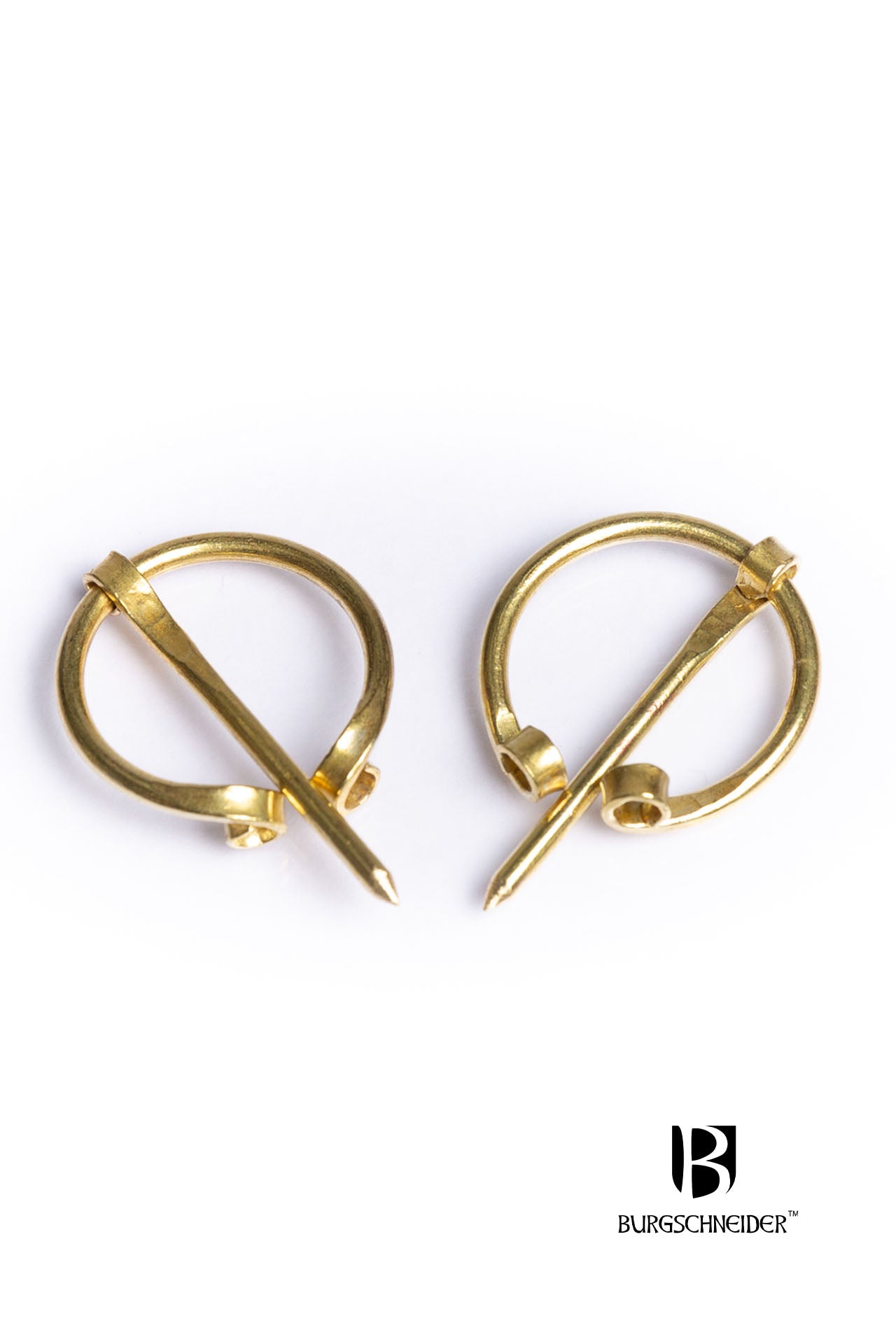 Set of 2 handmade brass brooches featuring omega design with ball endings, showcasing unique craftsmanship and historical significance.