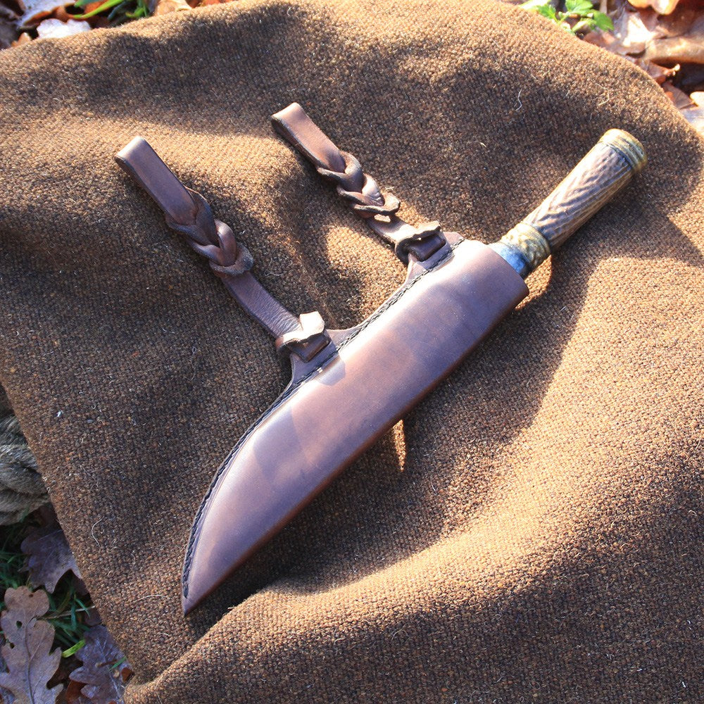 Sheath Pinus Brown made of leather, designed for sax dagger Ragnar, featuring braided straps for belt attachment.