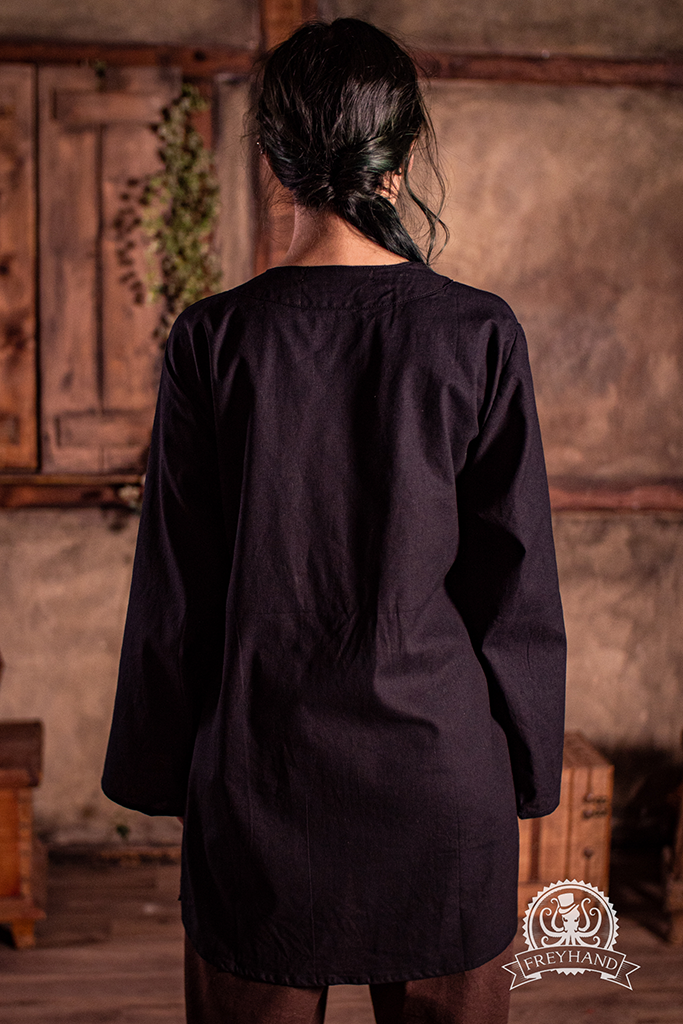 A stylish black shirt with a gender-neutral design, showcasing its excellent fit and quality fabric.