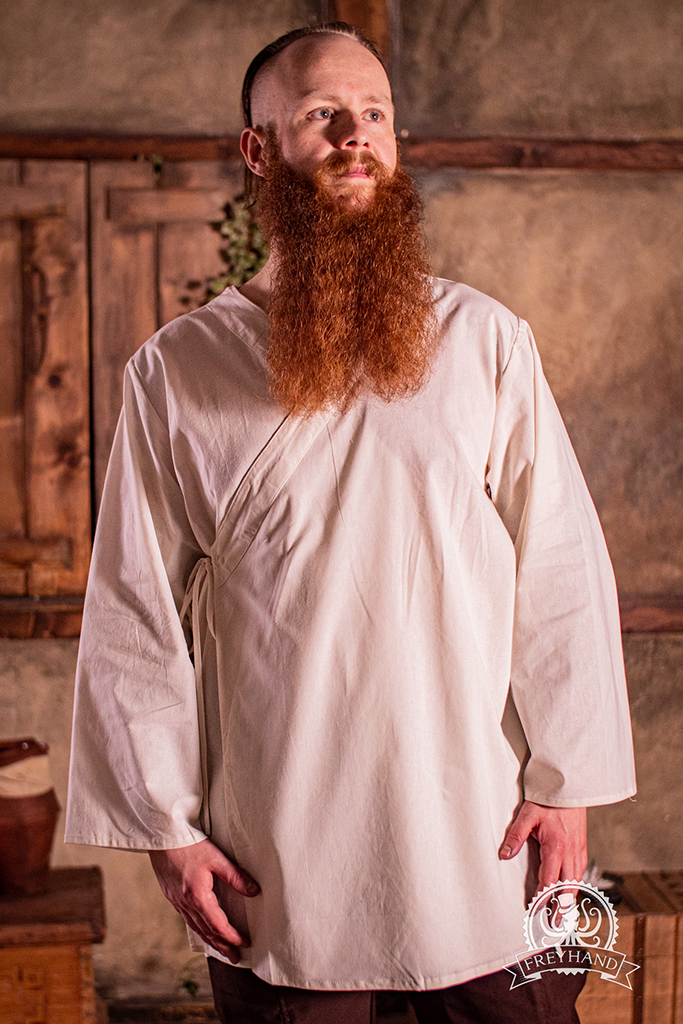 Shirt Jimbei Natural displayed on a mannequin, showcasing its gender-neutral design and excellent fit.