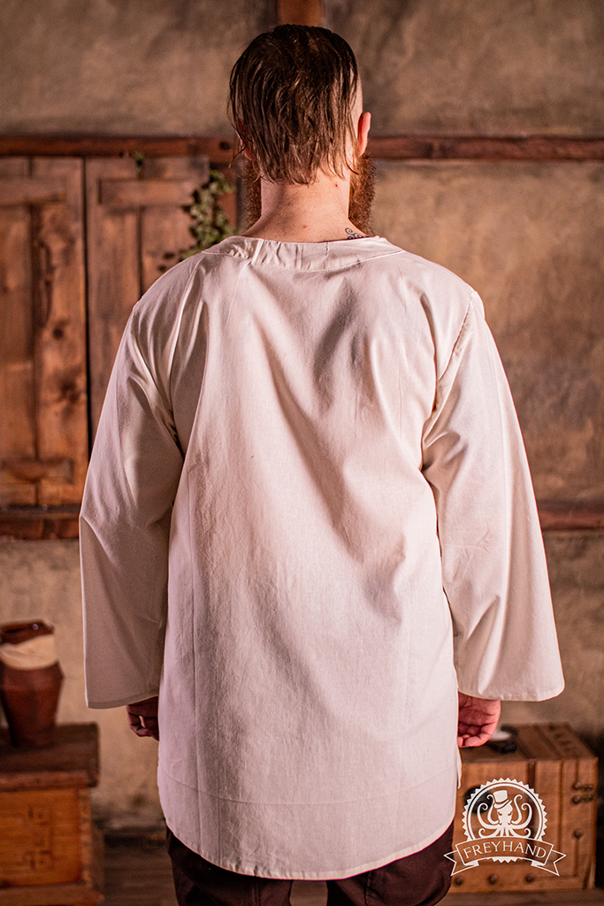 Shirt Jimbei Natural displayed on a mannequin, showcasing its gender-neutral design and excellent fit.