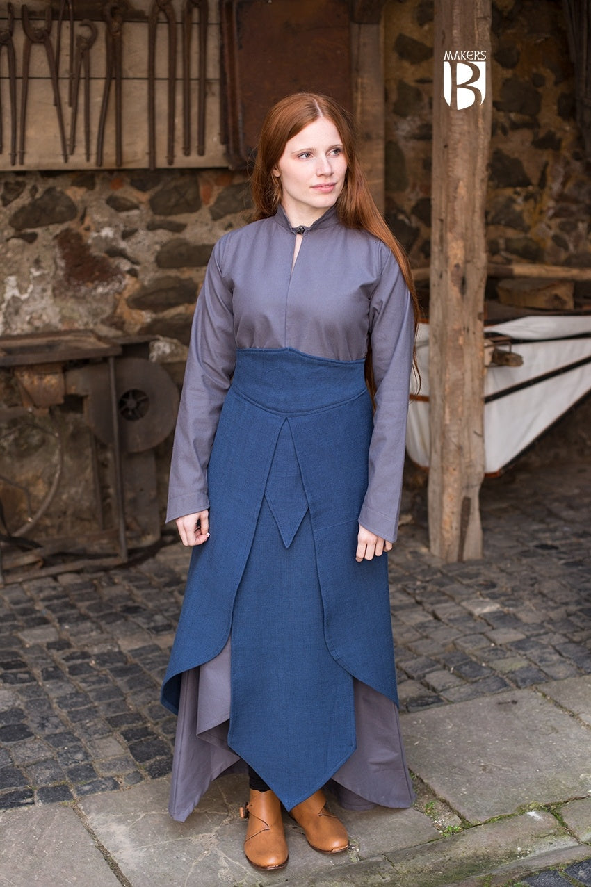 Tharya Blue Skirt featuring overlapping fabric panels, designed for noble roles, adjustable drawstring, and soft cotton material.