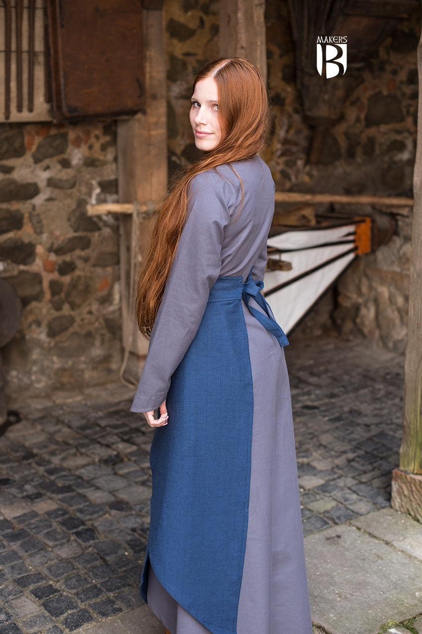 Tharya Blue Skirt featuring overlapping fabric panels, designed for noble roles, adjustable drawstring, and soft cotton material.