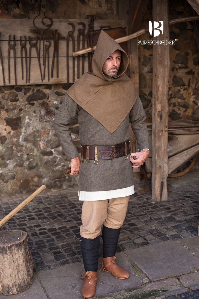 Skjoldehamn Cowl in Autumn Green, showcasing its unique square shape and wide brim, inspired by 11th-century design.