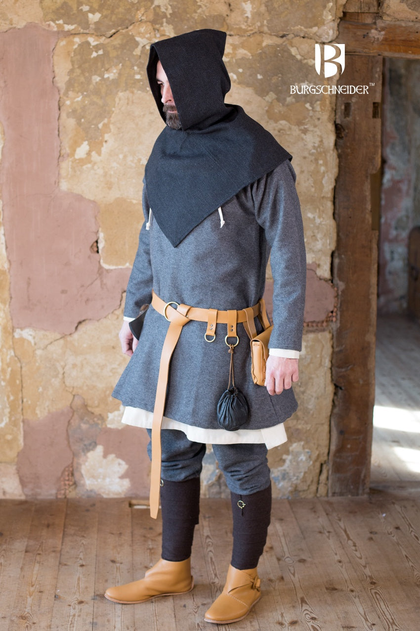 Skjoldehamn Cowl in black and grey herringbone pattern, showcasing its unique square shape and wide brim.