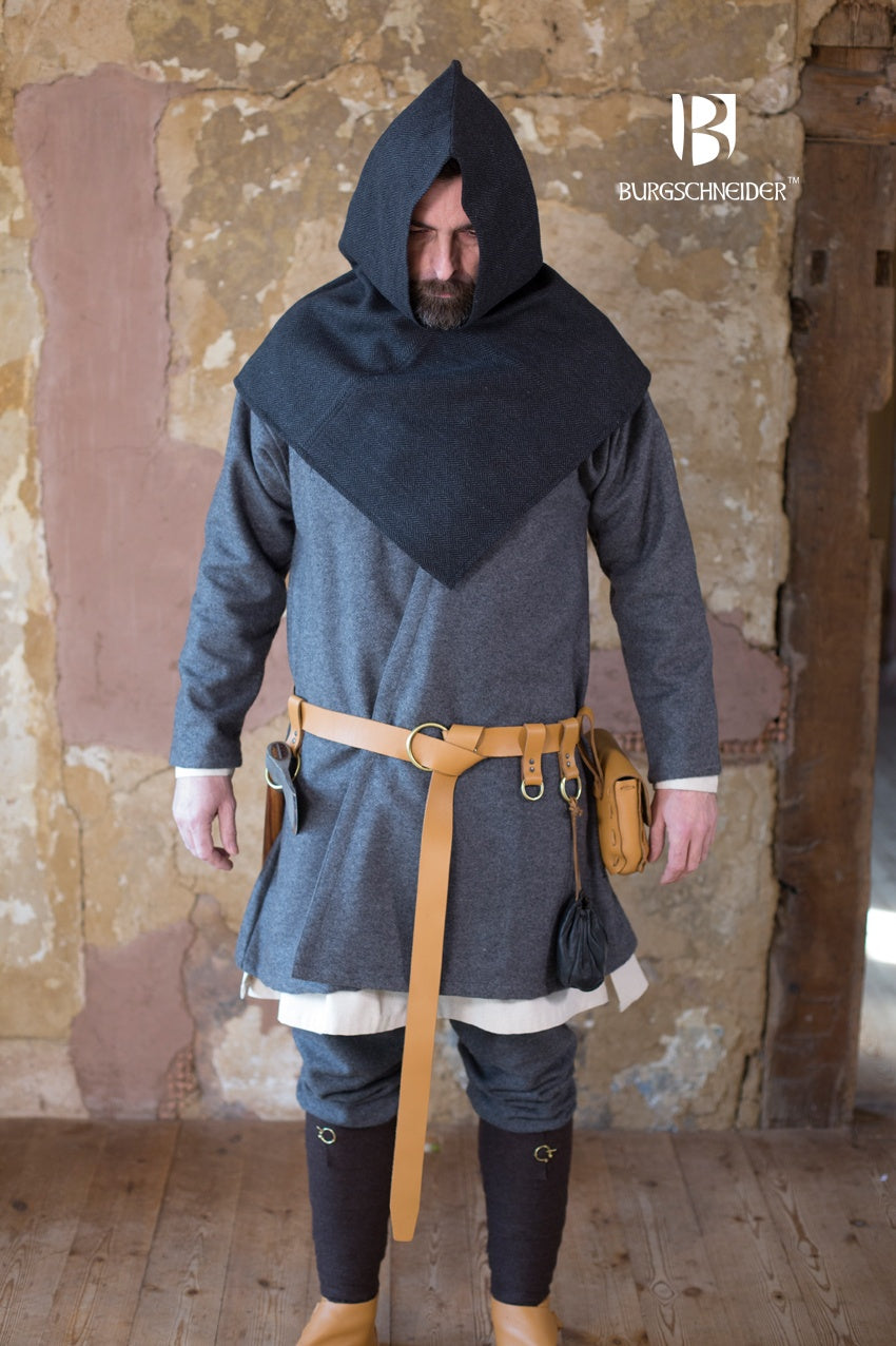 Skjoldehamn Cowl in black and grey herringbone pattern, showcasing its unique square shape and wide brim.