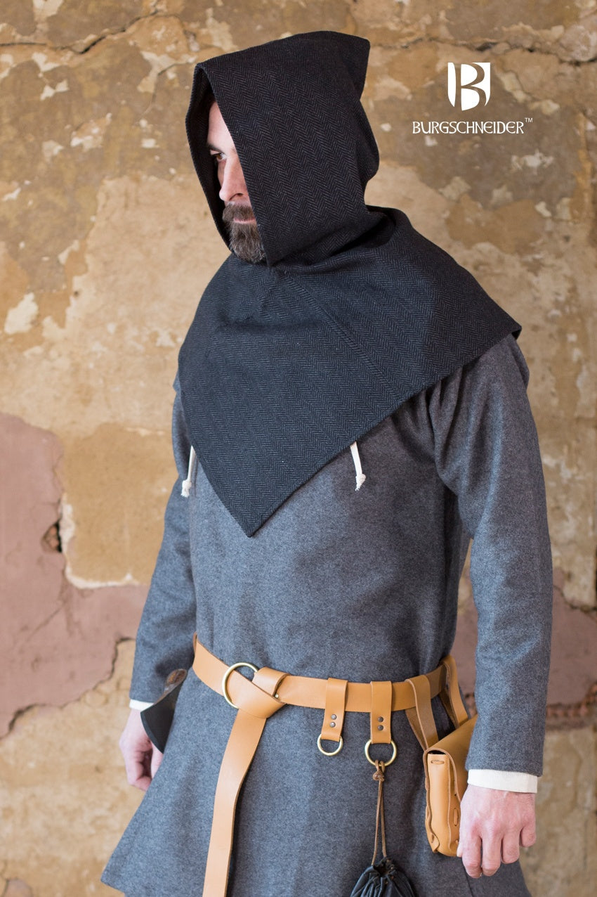 Skjoldehamn Cowl in black and grey herringbone pattern, showcasing its unique square shape and wide brim.