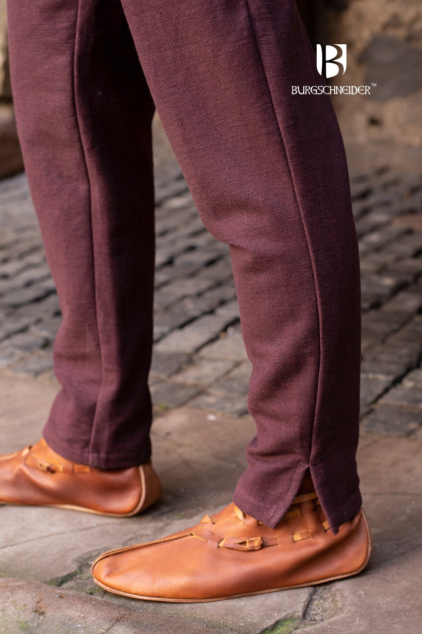 Gunnar Skjoldehamn Pants in brown, showcasing wool blend fabric and cuff slits for boot fitting.