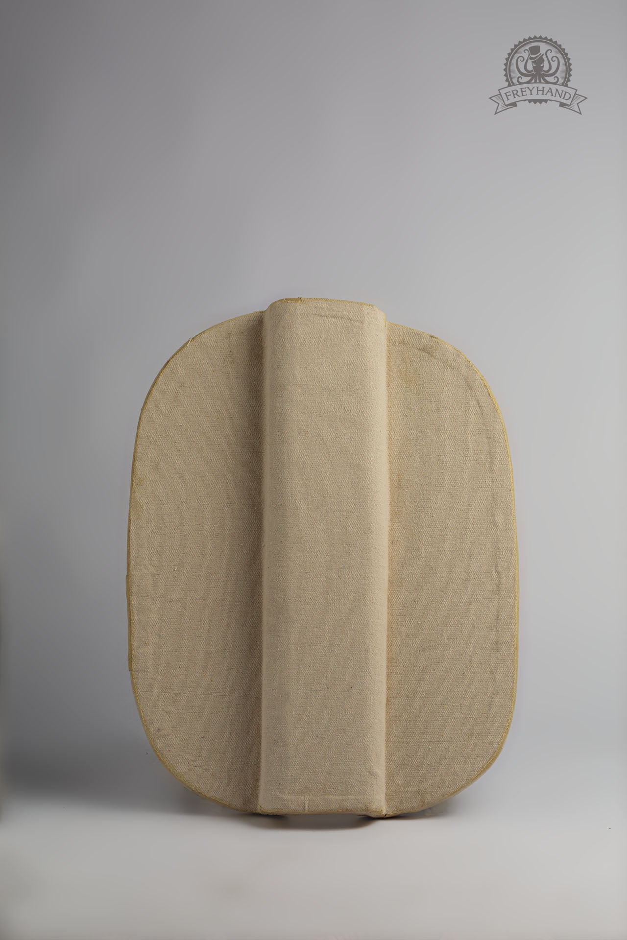 A customizable Small Shield Blank Pavese made of foam and canvas, featuring a rugged texture for painting and embellishments.