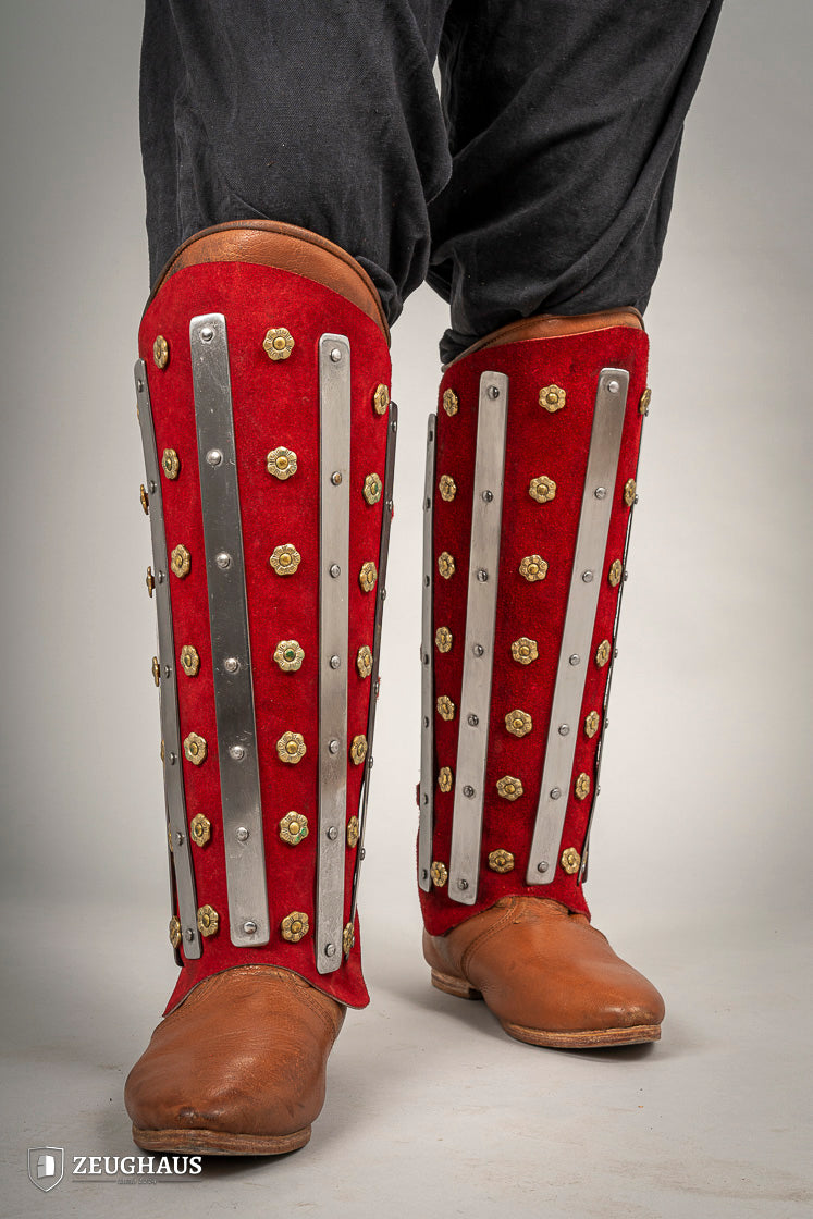 Splinted Suede Leather Greaves Red featuring a three-piece design with riveted metal bands and high-quality split leather.