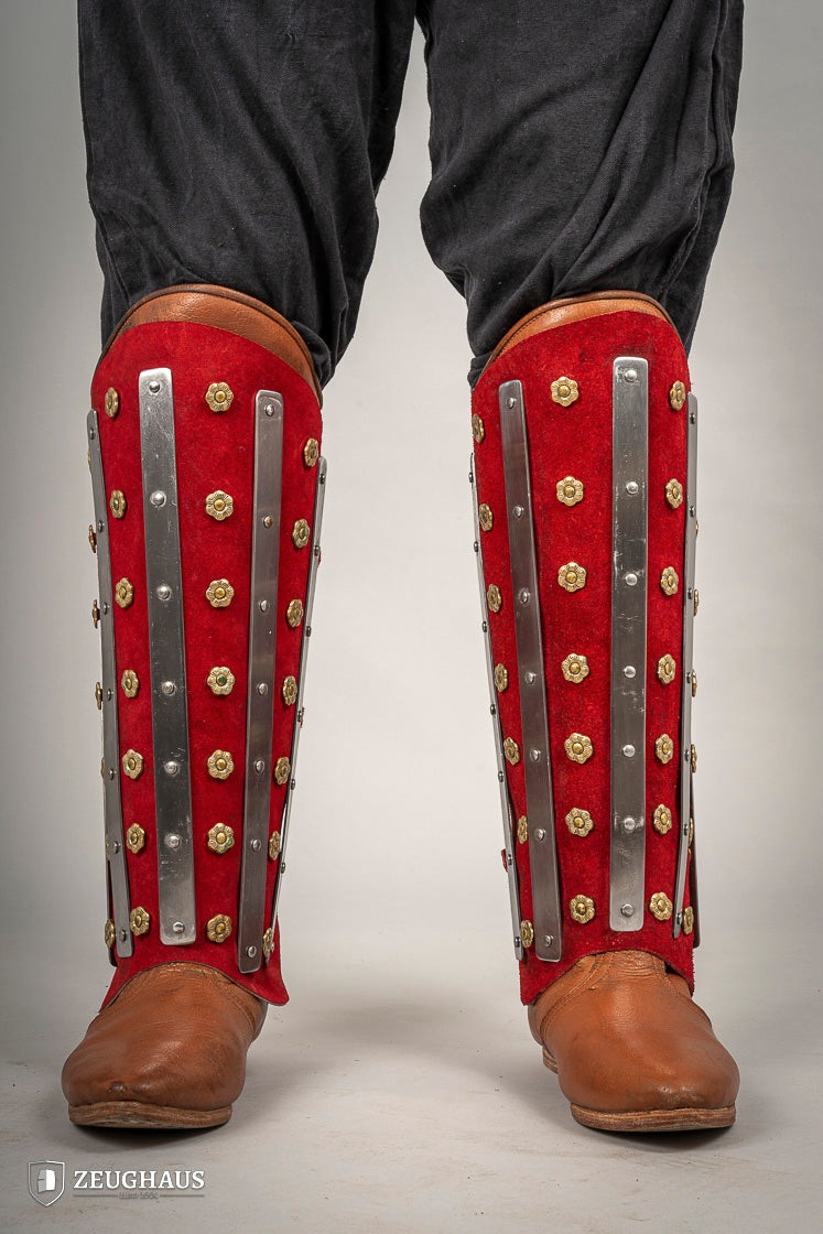 Splinted Suede Leather Greaves Red featuring a three-piece design with riveted metal bands and high-quality split leather.