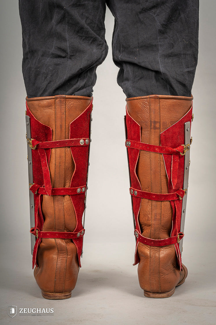 Splinted Suede Leather Greaves Red featuring a three-piece design with riveted metal bands and high-quality split leather.