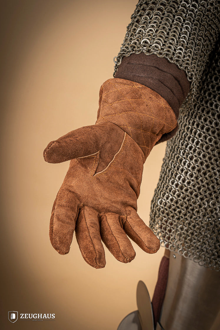 A pair of brown suede gloves designed for gauntlets, showcasing their soft texture and natural leather finish.