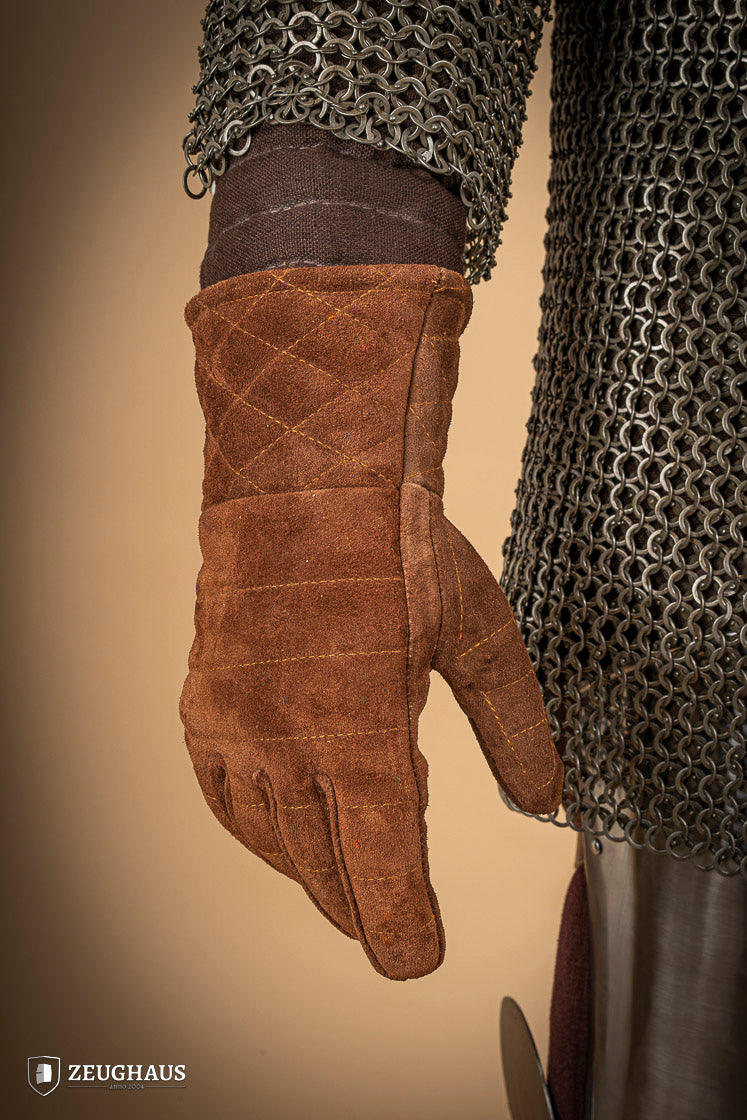 A pair of brown suede gloves designed for gauntlets, showcasing their soft texture and natural leather finish.