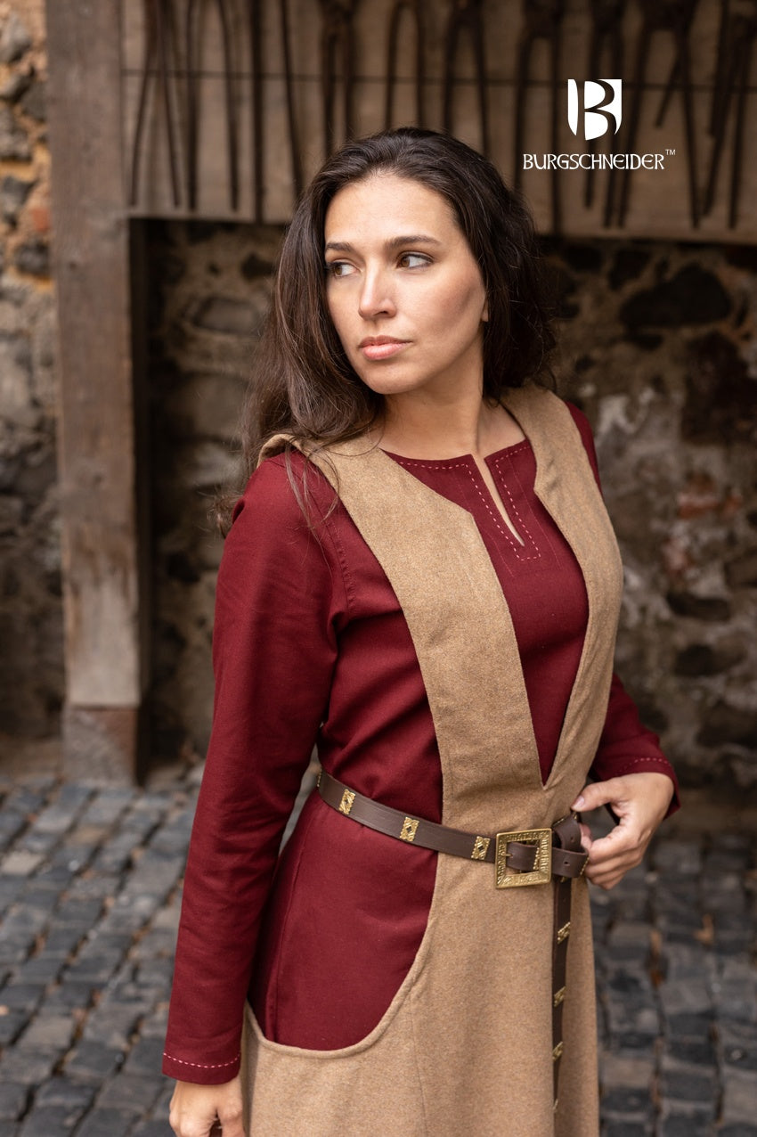 Ivrea Surcoat in Camel color, featuring a deep neckline and wide armholes, made from soft lightwool-flannel blend.