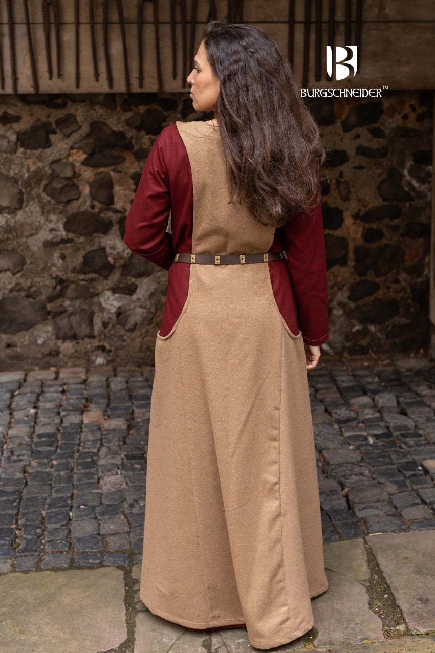 Ivrea Surcoat in Camel color, featuring a deep neckline and wide armholes, made from soft lightwool-flannel blend.