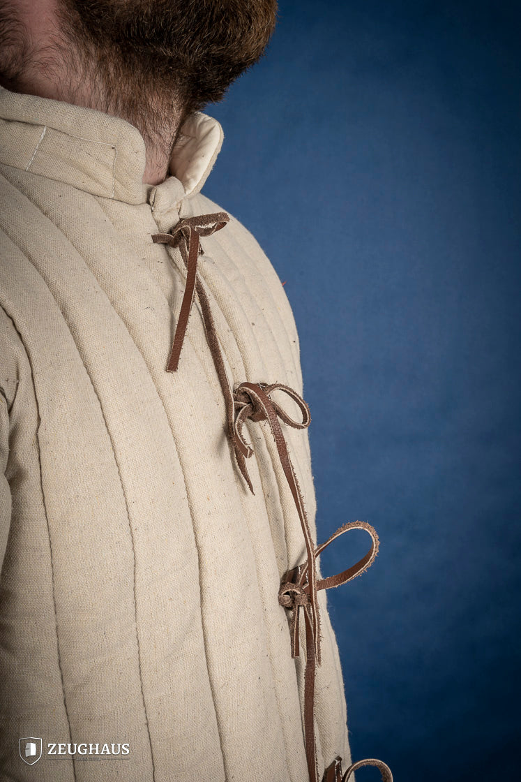 Thick Gambeson Natural made of 100% cotton canvas, featuring five leather strings for fastening, designed for protection and mobility.