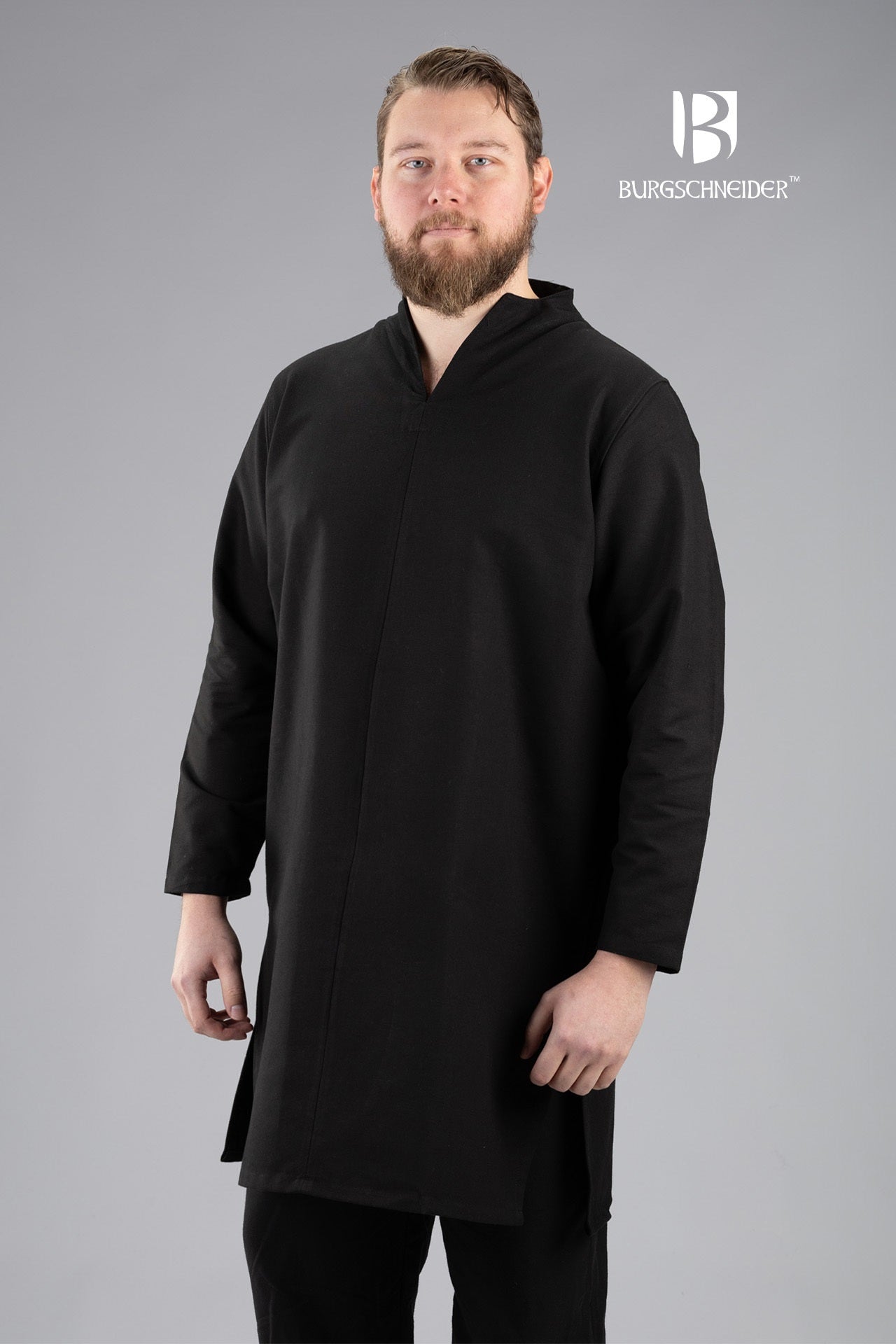 A stylish black tunic with side slits, made from pure cotton, designed for comfort and freedom of movement, ideal for historical reenactments.