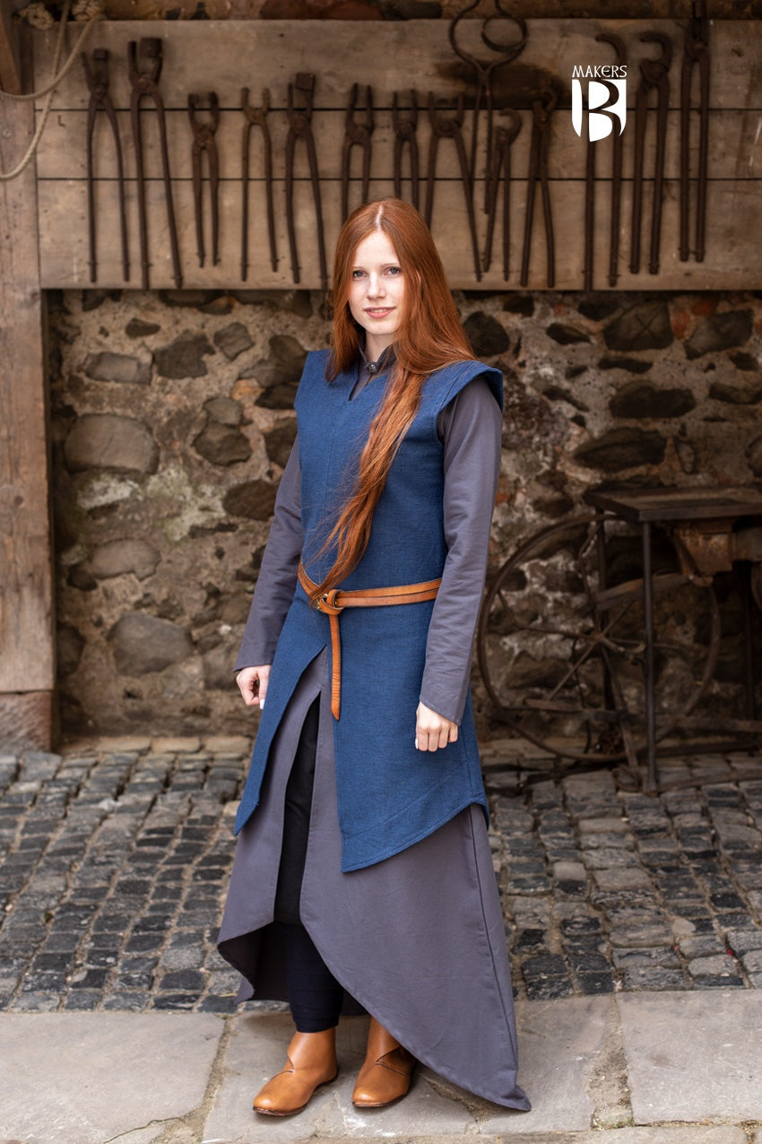 Eryn Blue Tunic made of robust cotton fabric, featuring wide sleeve holes and elegant design, perfect for outdoor adventures.