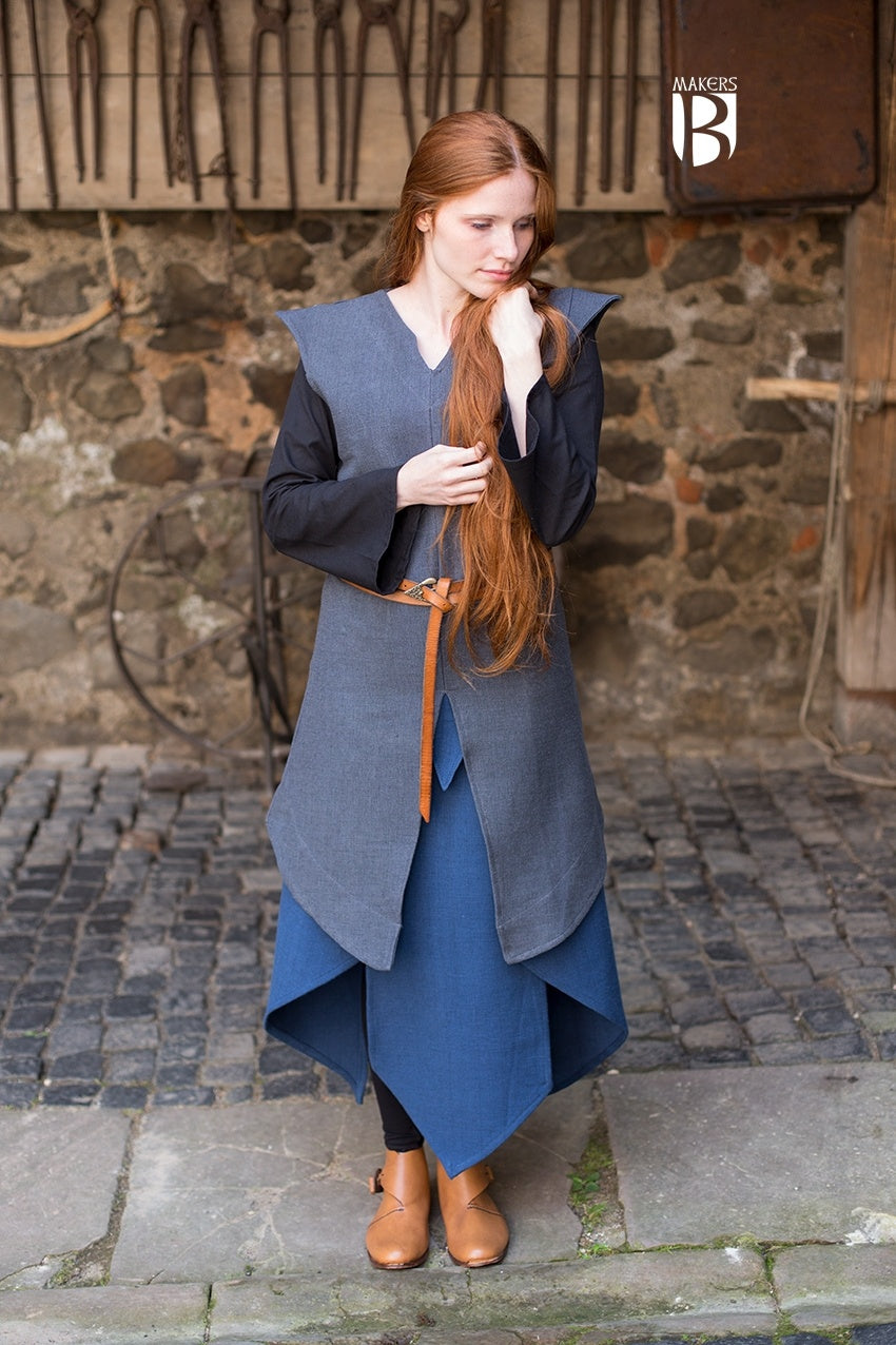 Eryn Grey Tunic displayed on a mannequin, showcasing its elegant design with wide sleeves and slits for movement.