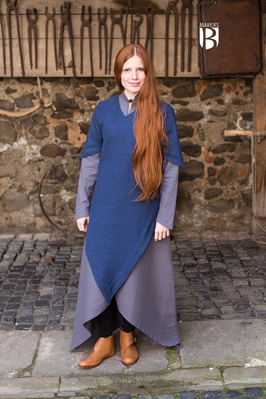 Tunic Laylin Blue featuring a unique cut and short sleeves, made from sturdy cotton fabric, perfect for versatile styling.