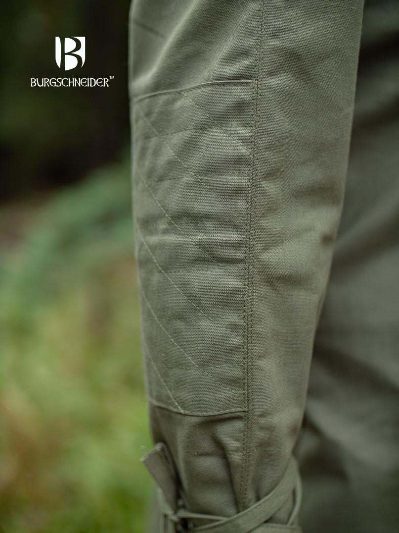 The Thereon Tunic in Seaweed, featuring long sleeves, quilted shoulders, and a v-shaped neckline, perfect for fantasy costumes.