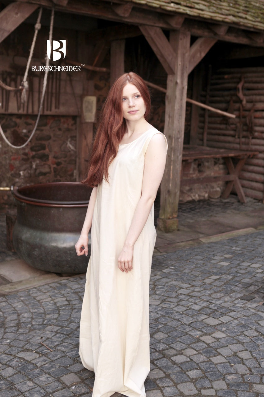 Aveline Natural Under Dress, sleeveless with wide straps and round neckline, perfect for summer layering.
