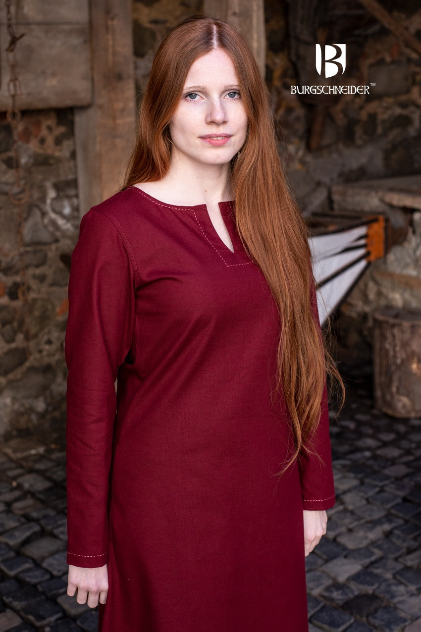 A medieval long-sleeved undergarment in rich bordeaux color, featuring decorative seams on the collar and sleeves, perfect for layering.