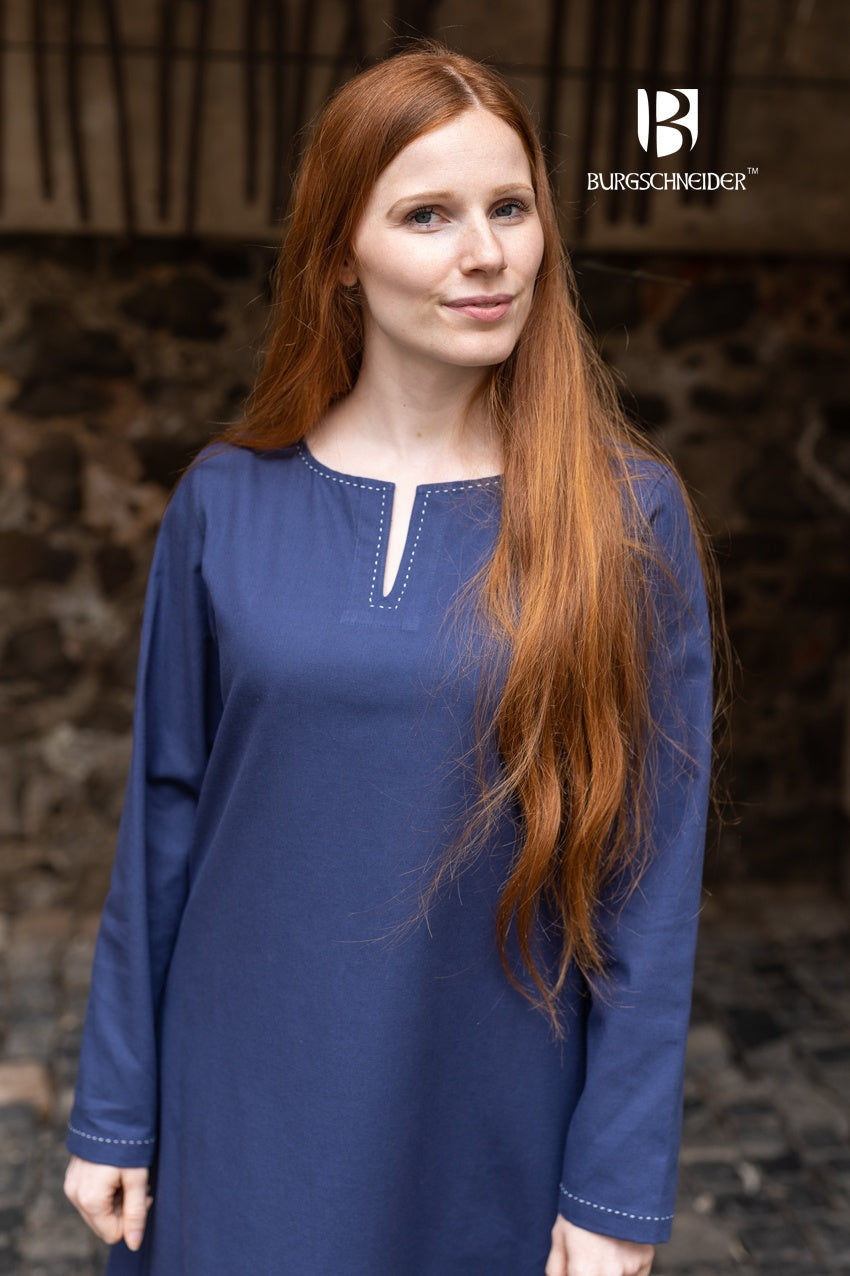 A medieval long-sleeved undergarment in dark blue, featuring decorative seams on the collar and sleeves, perfect for layering.